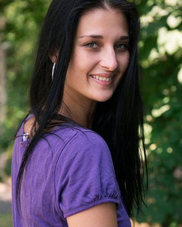 Perky naked Katya posing outdoors