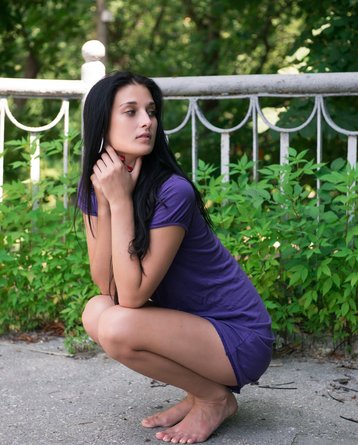 Perky naked Katya posing outdoors