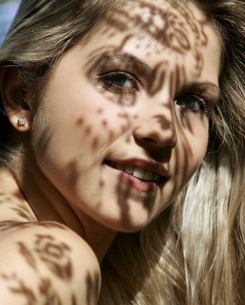 Jenni is nude in the forest