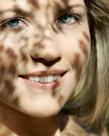 Jenni is nude in the forest