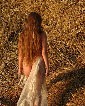 Natural Busty Redhead Posing In The Hay